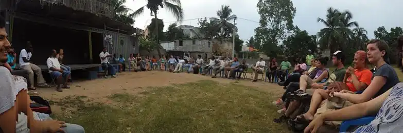 Community meeting in Las Malvinas by current shade structure to determine community desires and criteria.