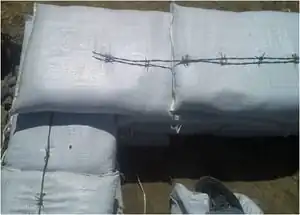 Figure 8 Barbed wire between layers (Photo courtesy of T. Sturgis)