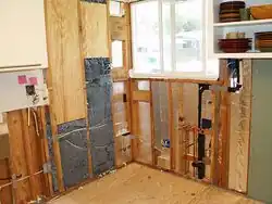 Fig 2: Cotton insulation home installation in progress. From flickr.com