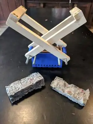 Newspaper briquet maker