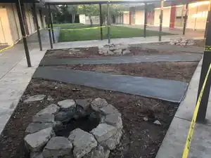 triangle of rebirthBenches that meet the students seating needs in an outdoor classroom environment.