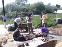 Forming the cob bricks for the kiosk.