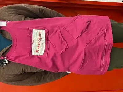 Wearing our first apron prototype.