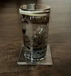 Second prototype of ferrofluid, testing how it behaves in an acrylic container with a saline suspension fluid.