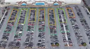 Electric Vehicle Charging Potential from Retail Parking Lot Solar Photovoltaic Awnings