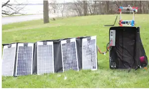 Mobile Open-Source Solar-Powered 3-D Printers for Distributed Manufacturing in Off-Grid Communities