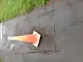 Part of the pine resin pavement is sinking