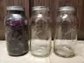 The first jar is almost full.