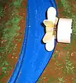 This image shows a water mill built from a turbine generator from KidWind, PVC