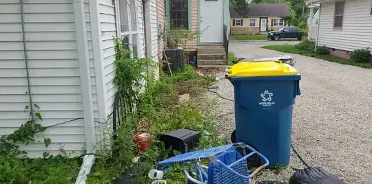 On this side of the house, it's just a few feet to a gravel driveway. Problem?