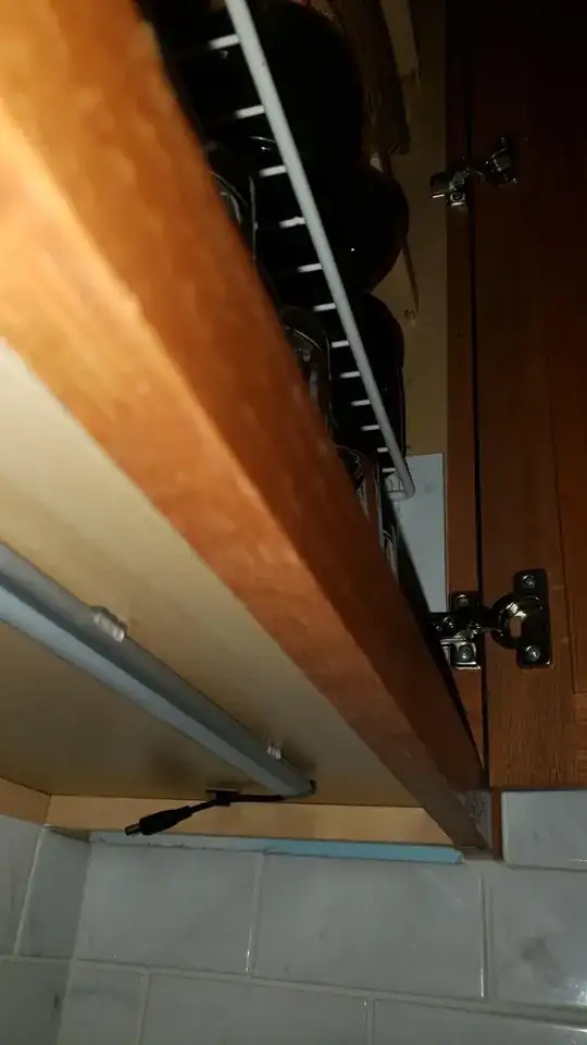 cabinet filed with glassware