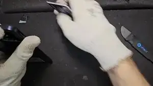 After the gap is large enough, I use a plastic card to open the rest.