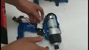 Install the switch, the battery connector, the LED and its protective lens, and position the cables back into the case.