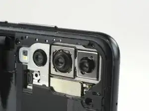 The P20 Pro may not have a fancy <a href="../../home/not_yet_available?url=/Teardown/Samsung%252BGalaxy%252BS9%252B%252BTeardown/104308%2523s195673" target="_blank">dual-aperture lens</a>, but it can laser focus. And deep focus. And phase focus. And contrast focus. Basically, <a href="../../home/external_content?url=https%3A//consumer.huawei.com/en/phones/p20-pro/specs/" rel="nofollow noopener noreferrer" target="_blank">it does a lot of fast focusing</a>.