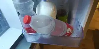 click for full image water bottle falling sideways