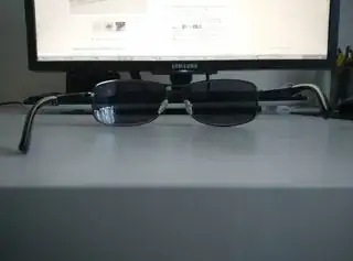 Sunglasses with misaligned arms