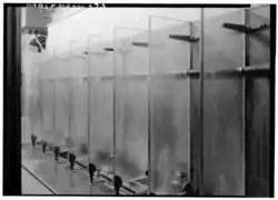 Vintage urinals in Boston secondary school (c. 1933–1959)