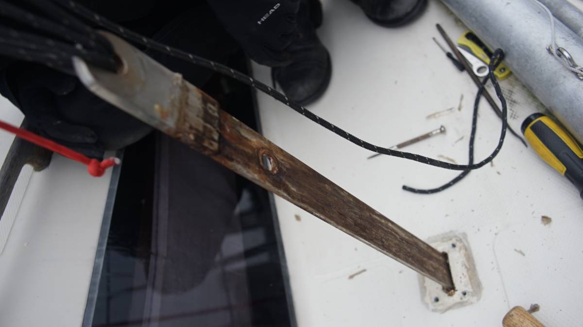 the starboard side forward chain plate pulled halfway out of the deck