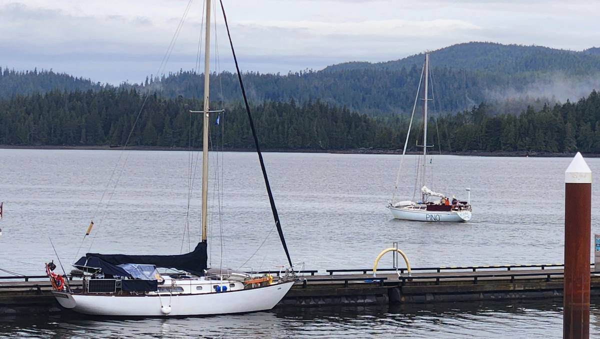 moonshine at the dock, with pino in the background heading towards Metlakatla pass