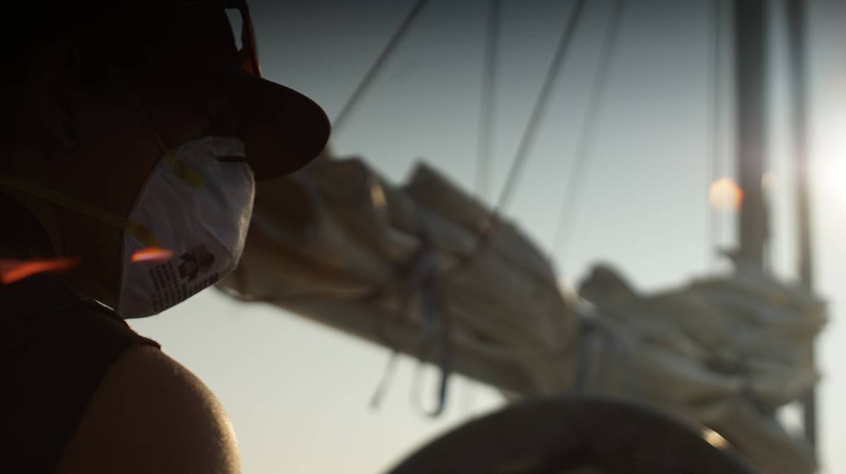 rek wearing a n95 mask