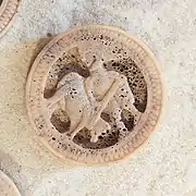 Man with animal on his back (possible)