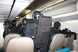 AGIGN overseas operators clearing an airliner during a demo - 2017