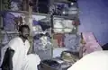The store of a Mauritanian shopkeeper. A Tuareg woman in a veil, 2001