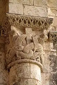 Capital decorated with intertwined beasts derived from Insular art. Grande-Sauve Abbey, France