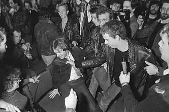 Vierling is removed from the Almere municipal council chambers during the installation of two Centre Party council members in 1984