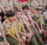 Image 23American Boy Scouts at summer camp in 2002. In the front row, the first three boys have made Eagle Scout and the 4th is one requirement away.