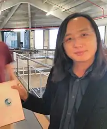 Taiwan minister and free software programmer Audrey Tang showing SwellRT sticker on her tablet