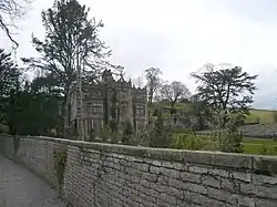 The stone facade of Holme Hall