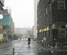 Donald Woods Building to the right, demolished 2014