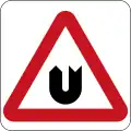 U-turn for oncoming traffic ahead