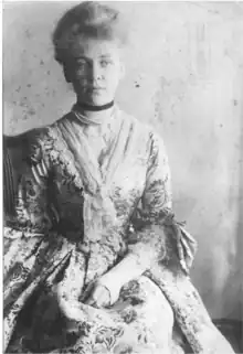 Huntington in her great great great Grandmother Elizabeth Pitkin's wedding dress, c. 1910