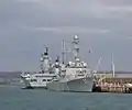 USS Mitscher at Portsmouth in October 2008 berthed with HMS Ark Royal and HMS Illustrious.