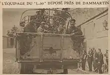 newspaper clipping of men in the back of a truck