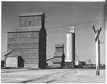 Grain elevators near the depot in Sublette (1950s)
