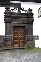 The lateral doorway in sculpted basalt