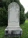 Old headstone with rounded top