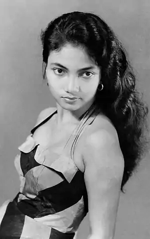 Image 13Lies NoorPhotograph credit: Djakartawood Studio; restored by Chris WoodrichLies Noor (c. 1938 – 1961) was an Indonesian actress. She first appeared on film in Pulang (Homecoming) in 1952, while she was still at school. She rose in popularity with a string of successful films, and was able to command high fees for her roles. In the mid-1950s, having married and had a child, she took a break from her career to care full-time for her son. After returning to acting in 1960, however, she developed encephalitis the next year and died in hospital two days later. This photograph of Noor was taken around 1956.More selected portraits