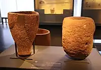 Limestone and basalt mortars, Eynan, Early Natufian, c. 12,000 BC