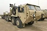 Oshkosh M1075A0 PLS truck with M1076 PLS trailer (Armor Holdings developed protection package)