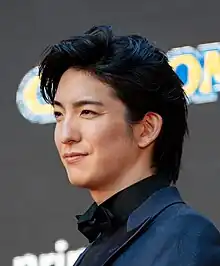 cropped three-quarter profile headshot of Maeda at Tokyo International Film Festival 2023