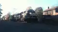 Norfolk Southern westbound delivery train passing through Three Bridges, Readington Township, New Jersey on the Lehigh Line, Picture 2- from back of train part one