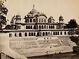 Samuel Bourne, "Palace & Tank. Built by Rajah Bulman Singh. Goverdhun 1311]," 1863–1869, photograph mounted on cardboard sheet