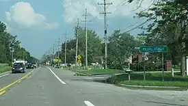 Road signage along Pointe Tremble Road (M-29)