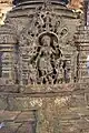Pillar pedestal relief in the open hall in Kalleshvara temple at Bagali