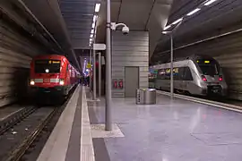 Class 182 of the Deutsche Bahn adjacent to a Talent 2 at Leipzig HBF Tief.