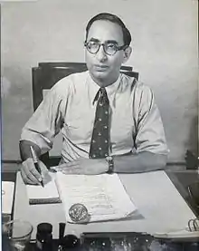 Ikram at his desk, c. 1935